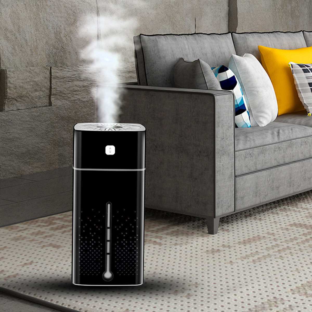 Air Purifier Humidifier emitting mist in a cozy living room setting with a gray couch and colorful pillows.