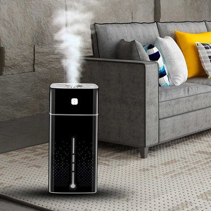 Air Purifier Humidifier emitting mist in a cozy living room setting with a gray couch and colorful pillows.
