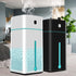 Air Purifier Humidifier in black and white color, showcasing mist spray and LED light features in a home setting.